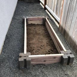 garden bed by Jass Gardening. this is before the dark, rich topsoil was added and drips were run garden bed by Jass Gardening. this is before the dark, rich topsoil was added and drips were run