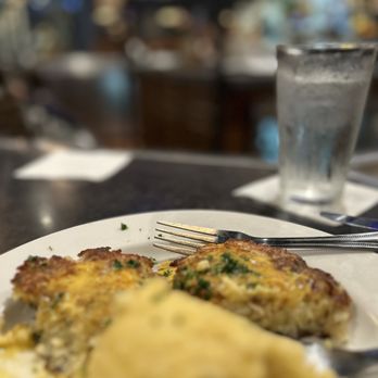 Patio 44 - Biloxi - Ok, terrible picture of my crab cakes and gouda grits but I offered samples to my colleagues before the picture - Steakhouses Near Me - Biloxi, Mississippi Patio 44 - Biloxi - Ok, terrible picture of my crab cakes and gouda grits but I offered samples to my colleagues before the picture - Steakhouses Near Me - Biloxi, Mississippi