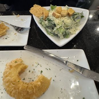 Summit Grill Kitchen & Cocktails - Onion ring and Ceasar salad - Bars Near Me - Fort Wayne, Indiana Summit Grill Kitchen & Cocktails - Onion ring and Ceasar salad - Bars Near Me - Fort Wayne, Indiana