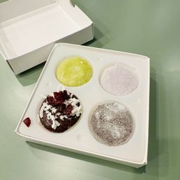 Mochi: Expresso, Green Tea, Purple Sweet Potato, Cranberry Chocolate Coconut. Mochi: Expresso, Green Tea, Purple Sweet Potato, Cranberry Chocolate Coconut.
