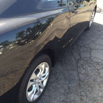 Magic Dent Removal - Dent on the side of my Civic coupe. - Mobile Dent Repair Near Me