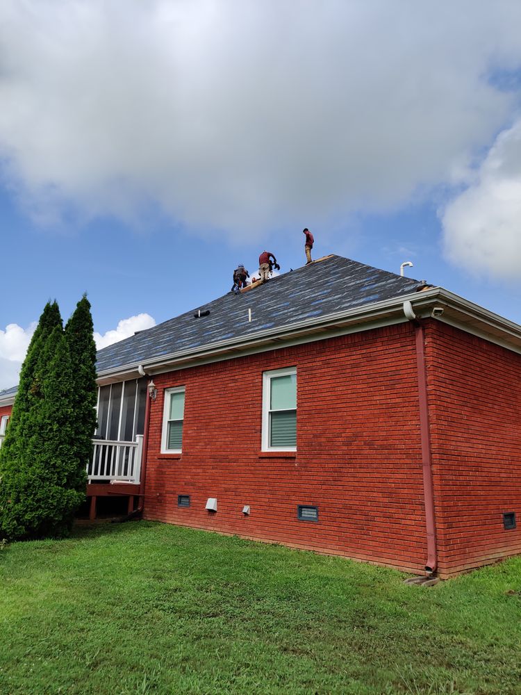 Slide of Storm Hunters Roofing