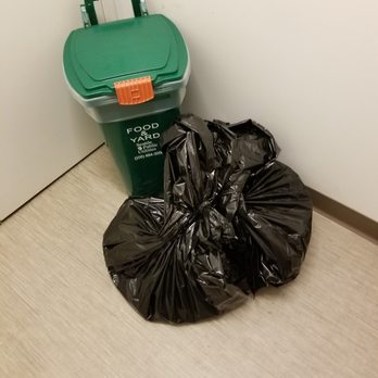 Helios Apartments - Garbage not placed in trash chute. - Apartments Near Me - Seattle, Washington