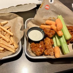 Mango Habanero boneless wings and fries