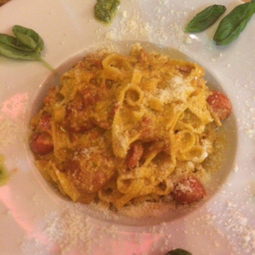 Fratelli La Bufala - Pasta with red sauce and garnished with pesto sauce- cherry tomatoes - Pizza Near Me - Rome, RM