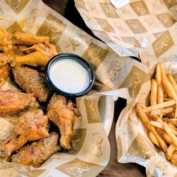 The Kickin Chicken - Buffalo wings, lemon pepper wings & large fries