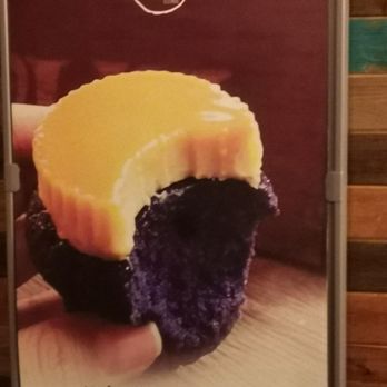 Cafe 86 - Leche Flan on top of an Ube Cupcake - Desserts Near Me - San Diego, California