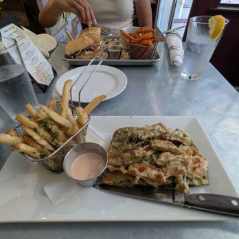 Franny's Farm Table - Prime rib dip ($24) w/ sweet potato fries (+$3) in the back. Chicken and pesto ($24) w/ garlic fries up front (+$3) - American Near Me - Placerville, California