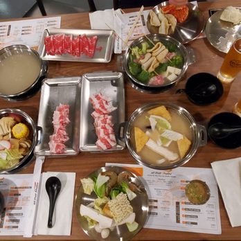 All That Shabu - Top two broths are bone broth, left bottom is the house broth (sukiyaki inspired broth), and right bottom is the miso broth - Buffets Near Me - Alhambra, California All That Shabu - Top two broths are bone broth, left bottom is the house broth (sukiyaki inspired broth), and right bottom is the miso broth - Buffets Near Me - Alhambra, California