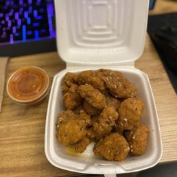 Boneless Wings (garlic parmesan) w/ a side of hot sauce.