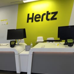 Hertz Rent A Car - Small rental counter in the back past the sales area