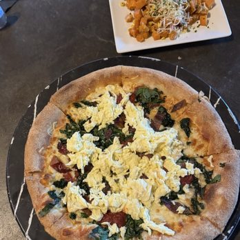 TruFire - Bacon and eggs breakfast pizza with sweet potato hash - New American Near Me - Frisco, Texas TruFire - Bacon and eggs breakfast pizza with sweet potato hash - New American Near Me - Frisco, Texas