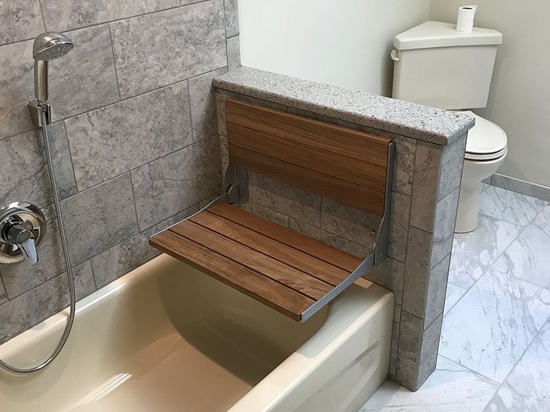 Slide of John M Toth Inc.