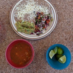 Angelina’s Resturant - Complimentary salsa, rice and beans and guac and limes