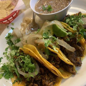 Taquerias Arandinas - Al pastor mini tacos with homemade corn tortillas and refried beans - Mexican Near Me - Austin, Texas Taquerias Arandinas - Al pastor mini tacos with homemade corn tortillas and refried beans - Mexican Near Me - Austin, Texas