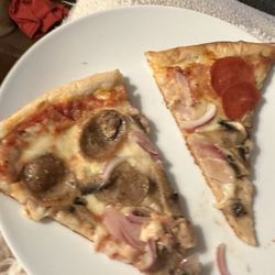 Soggy pizza with almost no sauce and thin tough crust at the end