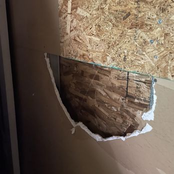 Extra Space Storage - There was a break-in and all they did was board up the holes and not build walls - Self Storage Near Me - Claremont, California