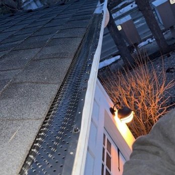 All Weather Seamless Raingutters - Installing leaf guards to prevent the build up of leaves, debris and dirt in gutters. - Gutter Services Near Me - Big Bear City, California All Weather Seamless Raingutters - Installing leaf guards to prevent the build up of leaves, debris and dirt in gutters. - Gutter Services Near Me - Big Bear City, California