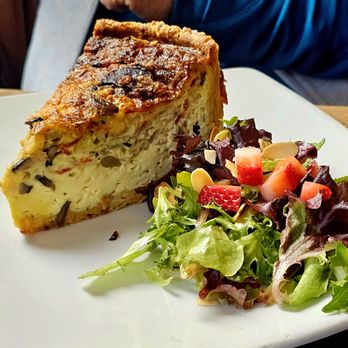 Cup Cafe - Quiche.  It had caramelized onions.  This would have been great.  However, it was served very cold.  I wouldn't even have called it warm. - New American Near Me - Tucson, Arizona