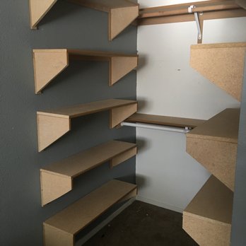 CM Remodeling - a walk in closet with shelves - Cabinetry Near Me