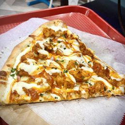 a slice of pizza on a tray a slice of pizza on a tray