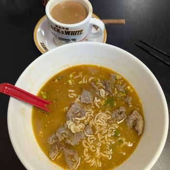 LetsSweet Kitchen - Satay beef noodle (half eaten) and coffee milk tea - Noodles Near Me - San Francisco, California LetsSweet Kitchen - Satay beef noodle (half eaten) and coffee milk tea - Noodles Near Me - San Francisco, California