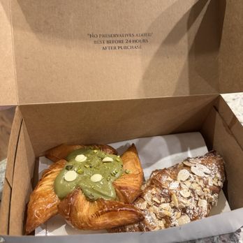 Creme De La Crumb - Pistachio cream and almond croissant - Coffee & Tea Near Me - Edmond, Oklahoma Creme De La Crumb - Pistachio cream and almond croissant - Coffee & Tea Near Me - Edmond, Oklahoma