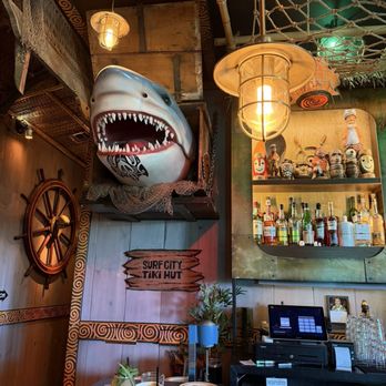 Surf City Tiki Hut - Left side of the bar with the shark head - Tiki Bars Near Me - Gilbert, Arizona Surf City Tiki Hut - Left side of the bar with the shark head - Tiki Bars Near Me - Gilbert, Arizona