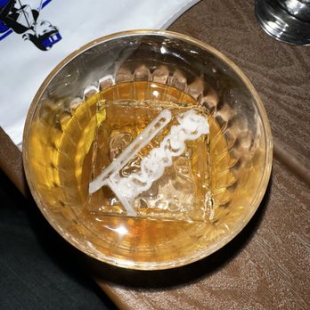 Trevor's Liquor - "Trevor's" inscribed ice cube in a delicious Sicilian Old Fashioned drink. - Beer, Wine & Spirits Near Me - Phoenix, Arizona