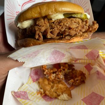 Bojangles - hand holding a sandwich - Fast Food Near Me - Fort Mill, South Carolina