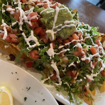 Corner Social - Mostly lettuce nachos ...messy to eat... very small tables. Terrible service. - New American Near Me - New York, New York Corner Social - Mostly lettuce nachos ...messy to eat... very small tables. Terrible service. - New American Near Me - New York, New York