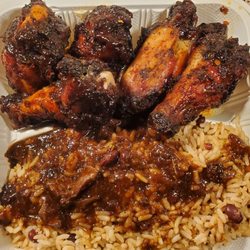 Temptress Caribbean Restaurant - Jerk Chicken Wings with rice n peas.