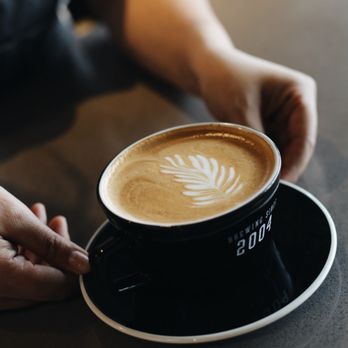 Wake Up Call - Edison - a person holding a cup of coffee - Coffee & Tea Near Me - Kennewick, Washington Wake Up Call - Edison - a person holding a cup of coffee - Coffee & Tea Near Me - Kennewick, Washington