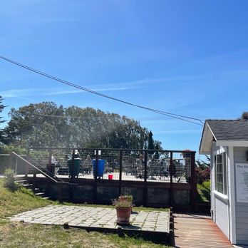 The Birds Cafe - Seating on the upper patio, and even more to the right of the building. - Seafood Near Me - Bodega Bay, California