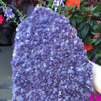 Precious Possessions - A large amethyst cluster that would look marvelous in any home. We have a giant selection of amethyst in our Michigan Ave store. - Jewelry Near Me - Chicago, Illinois Precious Possessions - A large amethyst cluster that would look marvelous in any home. We have a giant selection of amethyst in our Michigan Ave store. - Jewelry Near Me - Chicago, Illinois