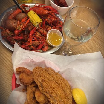 The Catch - a plate of food and a glass of wine - Seafood Near Me - Oklahoma City, Oklahoma The Catch - a plate of food and a glass of wine - Seafood Near Me - Oklahoma City, Oklahoma