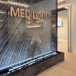 Exterior outside entrance of Med Lounge - Med Lounge - Corona Del Mar, water wall - Corona Del Mar, California Exterior outside entrance of Med Lounge - Med Lounge - Corona Del Mar, water wall - Corona Del Mar, California