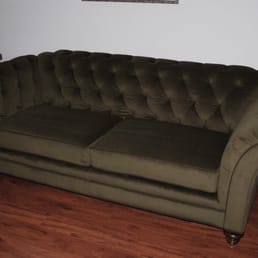 Here's the after pic of our sofa. Covington Upholstery dose amazing work.