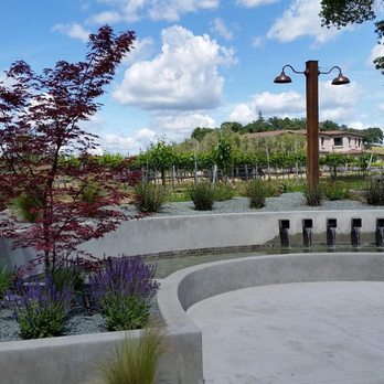 Verde Creations - a garden with a fountain and benches - Landscaping Near Me - Granite Bay, California