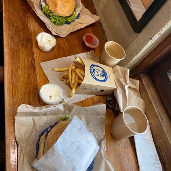 Fergburger - Fergburger with Cheese / Side of fries with aioli and tomato sauce - Burgers Near Me - Queenstown, OTA Fergburger - Fergburger with Cheese / Side of fries with aioli and tomato sauce - Burgers Near Me - Queenstown, OTA
