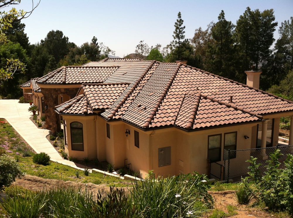 Slide of New Era Roofing