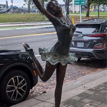 Lechon - Whimsical dancing girl statue out front - Tapas Bars Near Me - Portland, Oregon