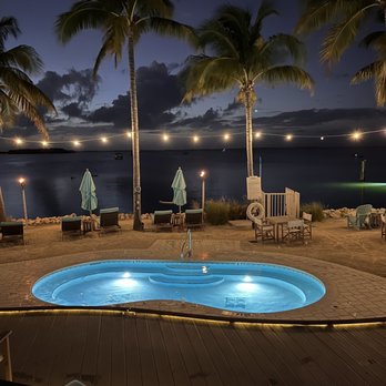 Bungalows Key Largo - View from the top of the main pool looking over the extra large jacuzzi - Resorts Near Me - Key Largo, Florida