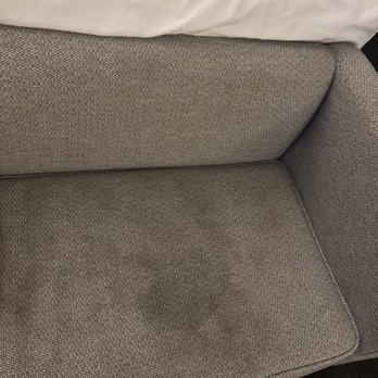 Hyatt Regency Savannah - Stained couch on the end of one of the double beds - Hotels Near Me - Savannah, Georgia Hyatt Regency Savannah - Stained couch on the end of one of the double beds - Hotels Near Me - Savannah, Georgia