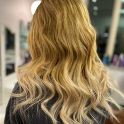 Hand tied weft extensions