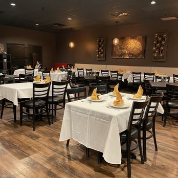 Thai In Town - a dining room with tables and chairs - Thai Near Me - Bountiful, Utah Thai In Town - a dining room with tables and chairs - Thai Near Me - Bountiful, Utah