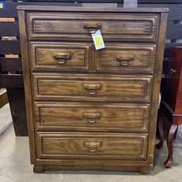 Vintage wood dresser with a leather top