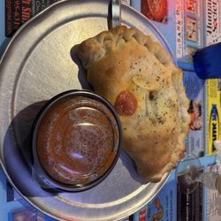 Mater's Pizza & Pasta Emporium - Sausage, Mushroom and Onion Calzone and the World famous Mater's sauce! YUM!
