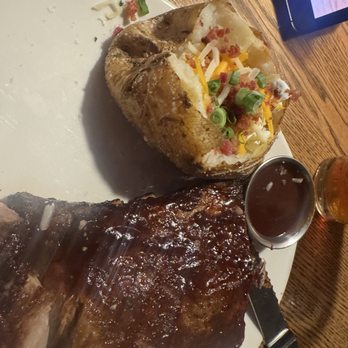 Outback Steakhouse - Ribs and potato - Steakhouses Near Me - Charlotte, North Carolina