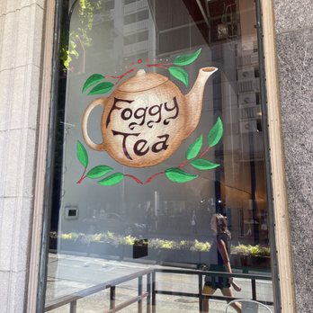 Foggy Tea Shop - a woman walking past a teapot - Tea Rooms Near Me - Seattle, Washington Foggy Tea Shop - a woman walking past a teapot - Tea Rooms Near Me - Seattle, Washington